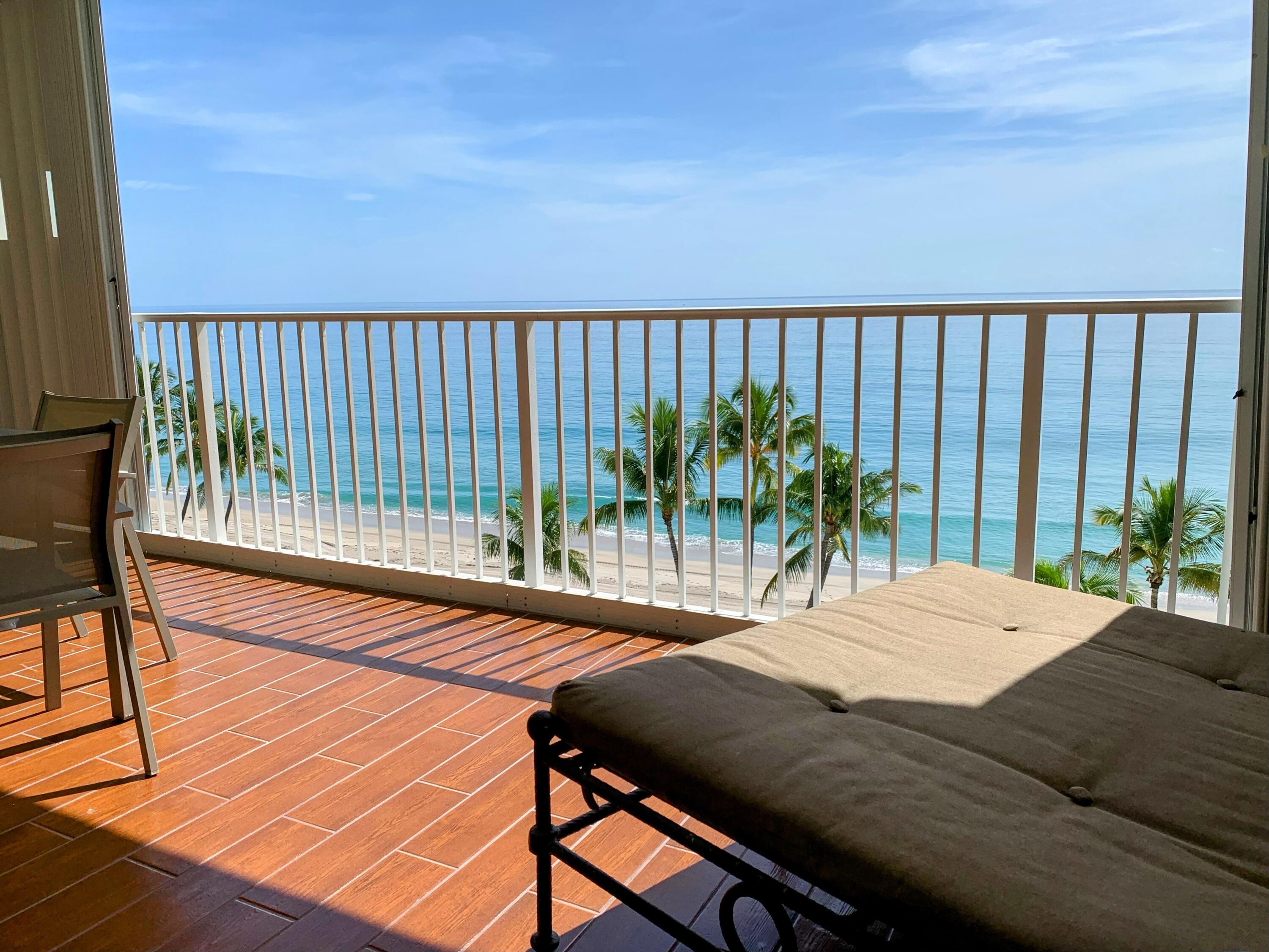 3101 South Ocean Boulevard, Unit 712 Highland Beach, FL 33487 - Photo 2 of 25 a view of a chairs and table in patio