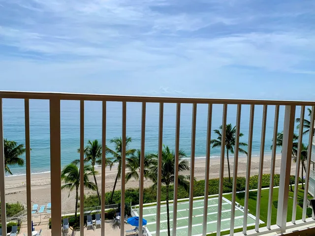a balcony with a ocean view