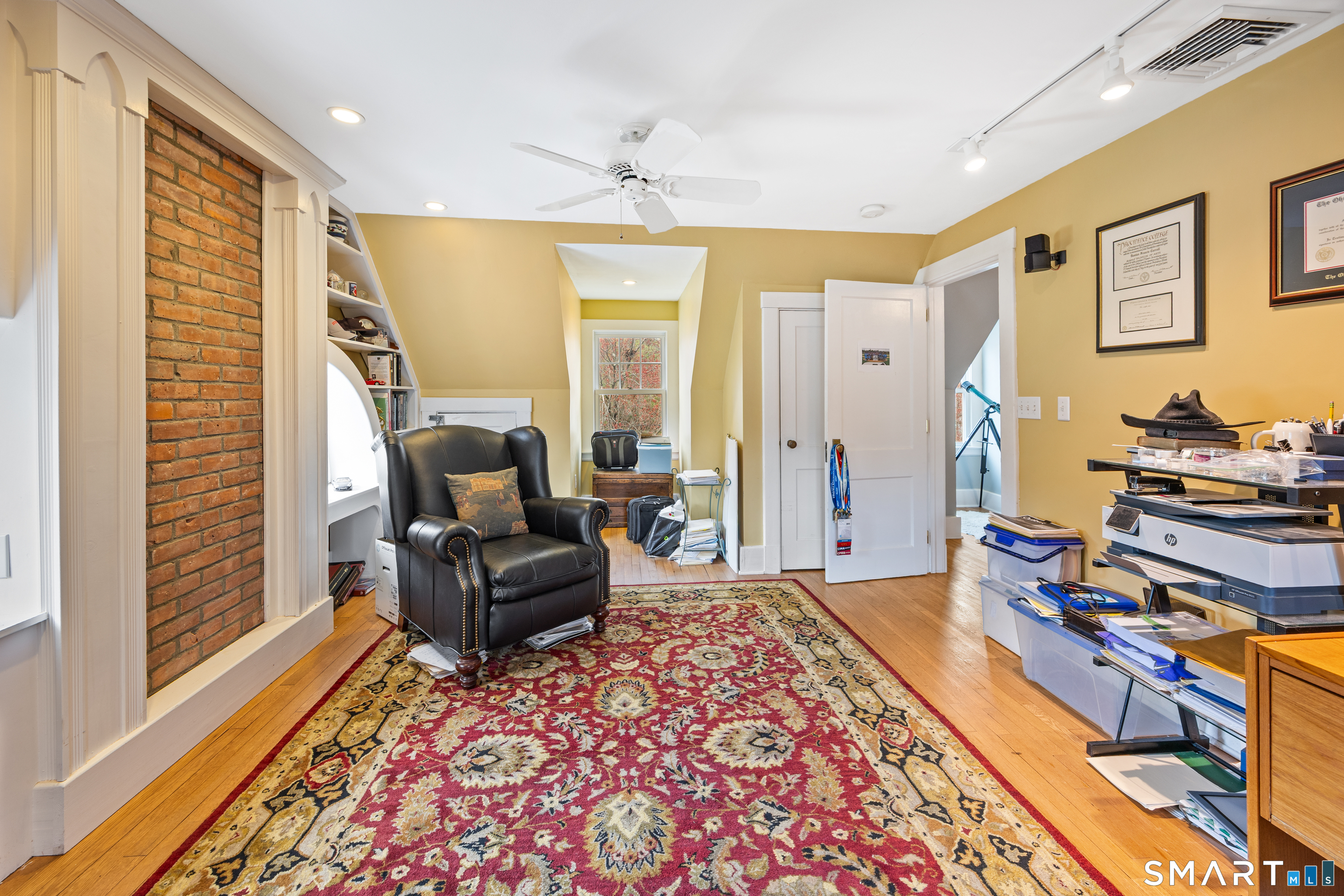 40 10 Acre Road New Britain, CT 06052 - Photo 31 of 38 a living room with furniture and a rug