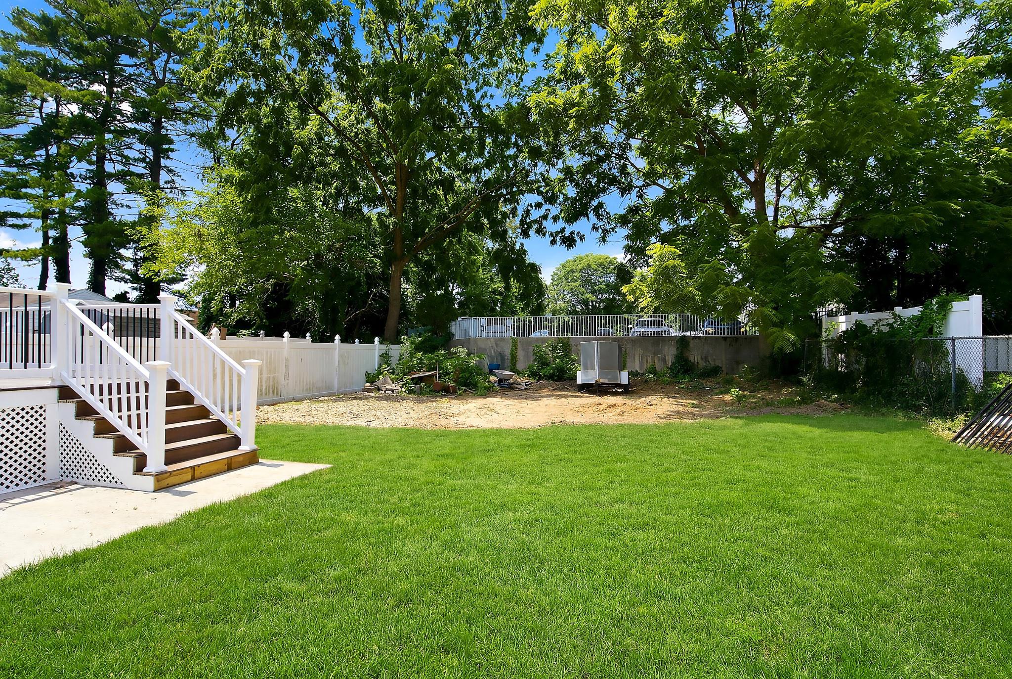 2589 Yardville Hamilton Square Road Hamilton, NJ 08690 - Photo 24 of 24 Huge backyard. Grass is AI generated