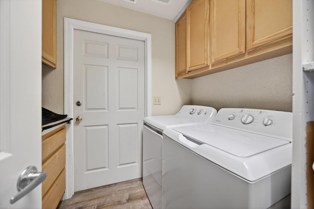 13512 Alta Mesa Road Galt, CA 95632 - Photo 48 of 99 a utility room with dryer and washer