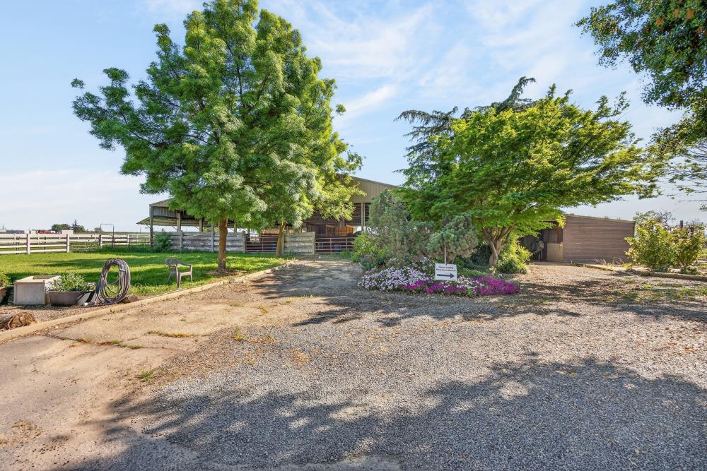 13512 Alta Mesa Road Galt, CA 95632 - Photo 56 of 99 a view of a road with a house in the background