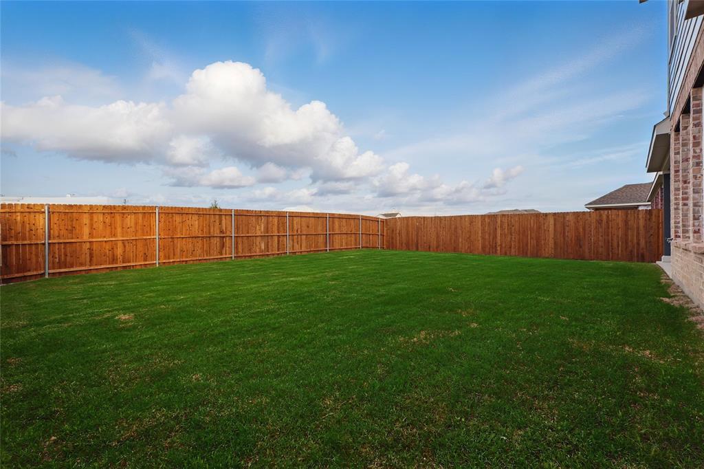 2521 Rivers West Road Anna, TX 75409 - Photo 30 of 40 a view of field with grass and wooden fence