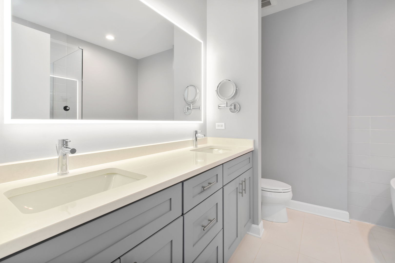 1738 South Indiana Avenue Chicago, IL 60616 - Photo 16 of 29 a bathroom with a sink a toilet and a large mirror
