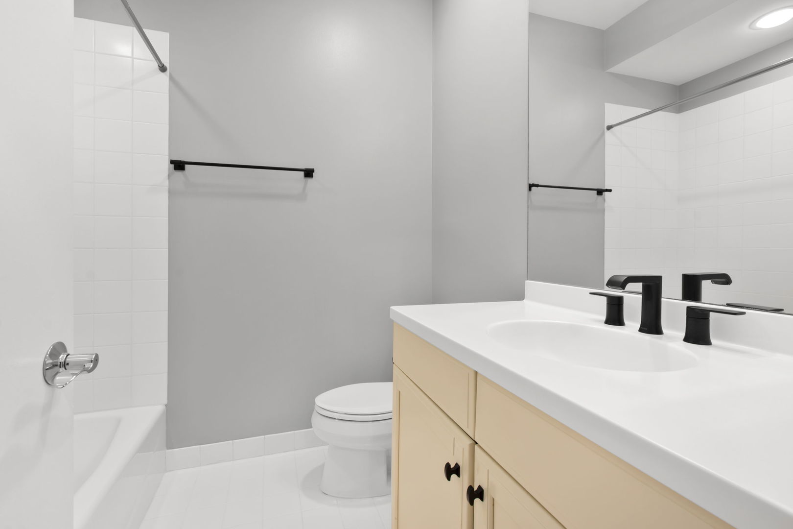 1738 South Indiana Avenue Chicago, IL 60616 - Photo 19 of 29 a bathroom with a sink a toilet and shower