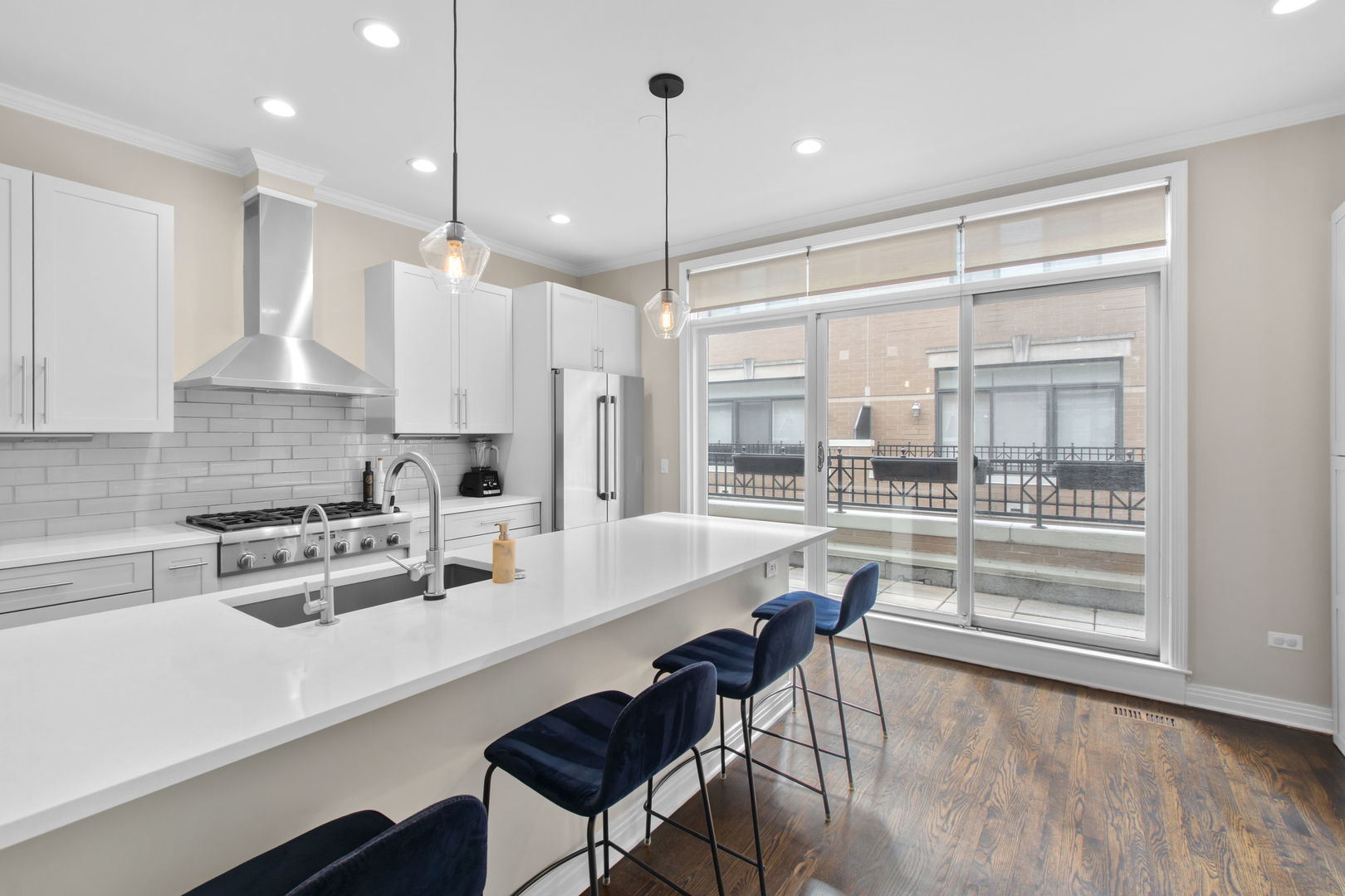 1738 South Indiana Avenue Chicago, IL 60616 - Photo 9 of 29 a kitchen with a table chairs stove and cabinets