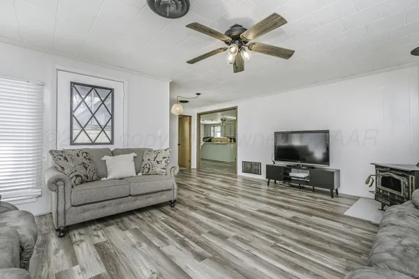 a bathroom with a sink a mirror and a shower