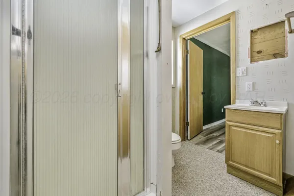 a view of a room that has a window in it