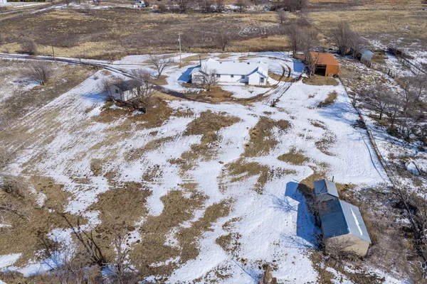 a view of a backyard of a house