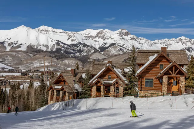 a view of a house with a snow on the road