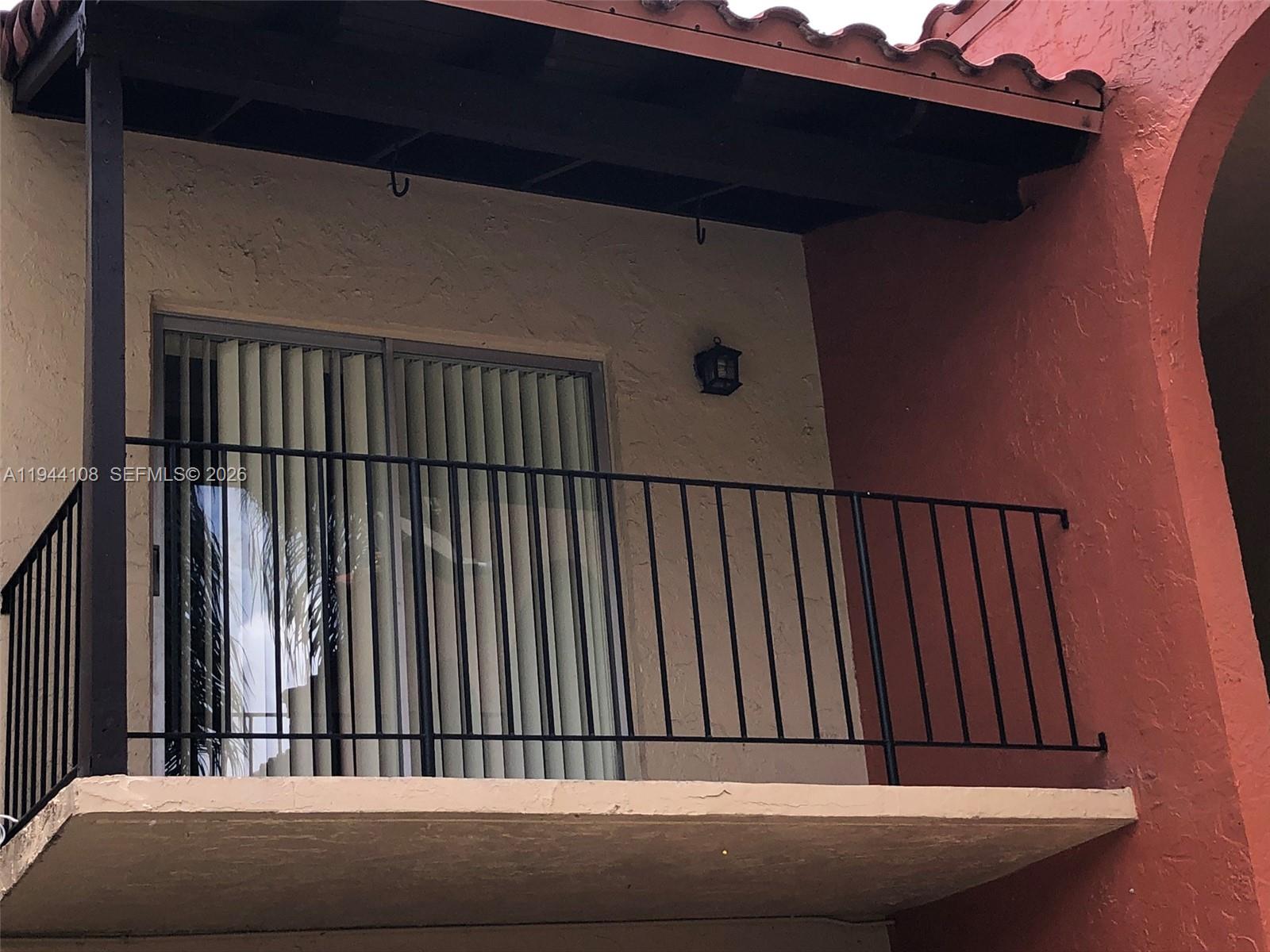 10794 North Kendall Drive, Unit B14 Miami, FL 33176 - Photo 7 of 23 a view of balcony