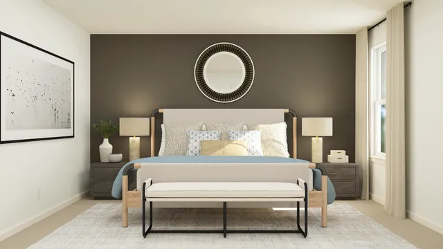 a bedroom with a bed and a painting on the wall