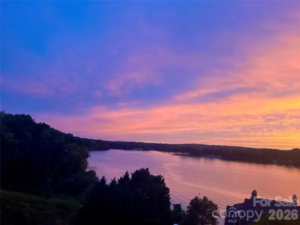 a view of lake and sunset