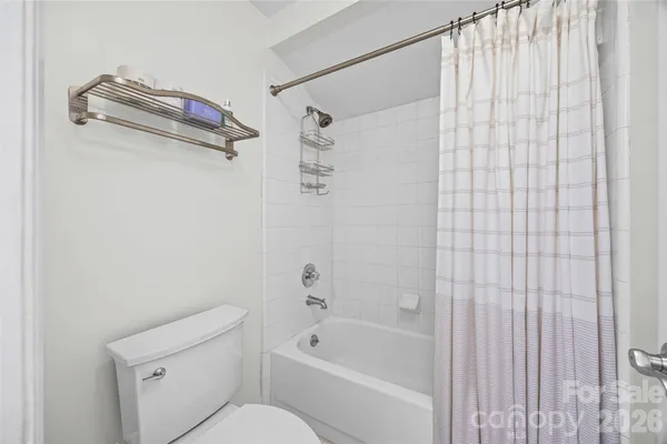 a utility room with washer and dryer
