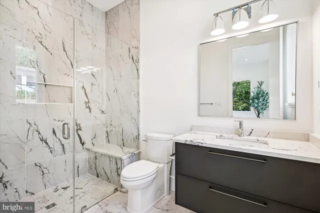 a view of room with stairs and furniture