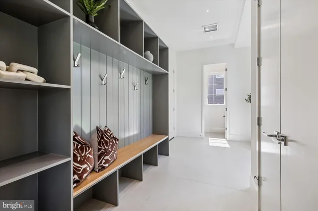 a view of an empty room with a floor to ceiling window and pool table