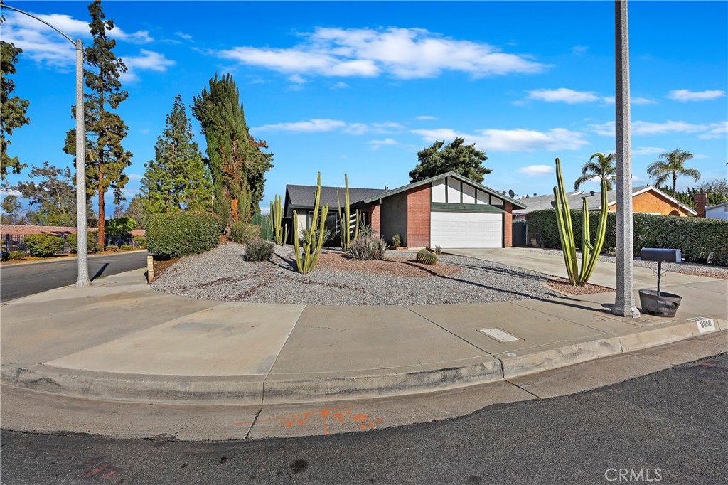 8858 Toronto Road Riverside, CA 92504 - Photo 1 of 1 a view of a house with a street