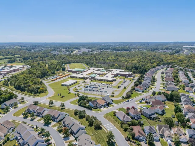 an aerial view of residential house with outdoor space