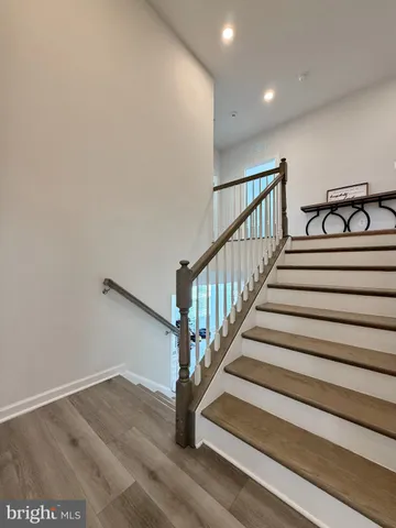 a utility room with closet dryer and washer