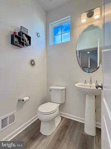 a bathroom with a shower and a toilet