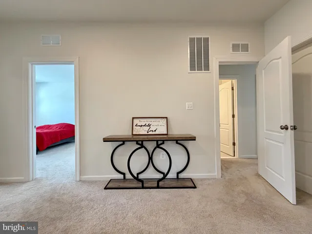 a bathroom with a sink a vanity and a shower