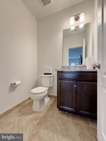 a view of yard with swimming pool and trees in the background