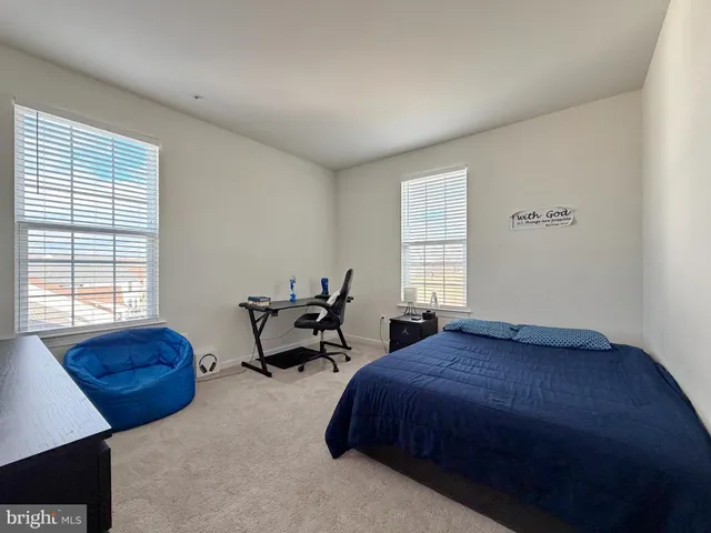 a utility room with closet dryer and washer