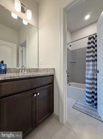 a view of an empty room with stairs