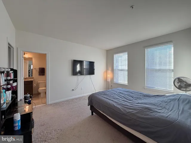 a view of yard with swimming pool and trees in the background