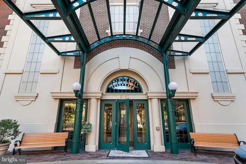 a view of hall way with furniture