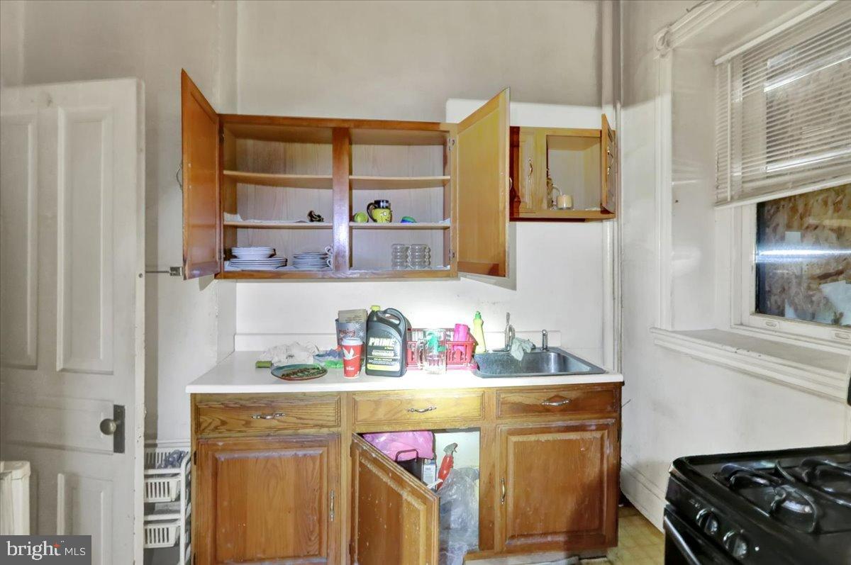 200 West Lancaster Avenue Reading, PA 19607 - Photo 24 of 50 a kitchen with a refrigerator and cabinets
