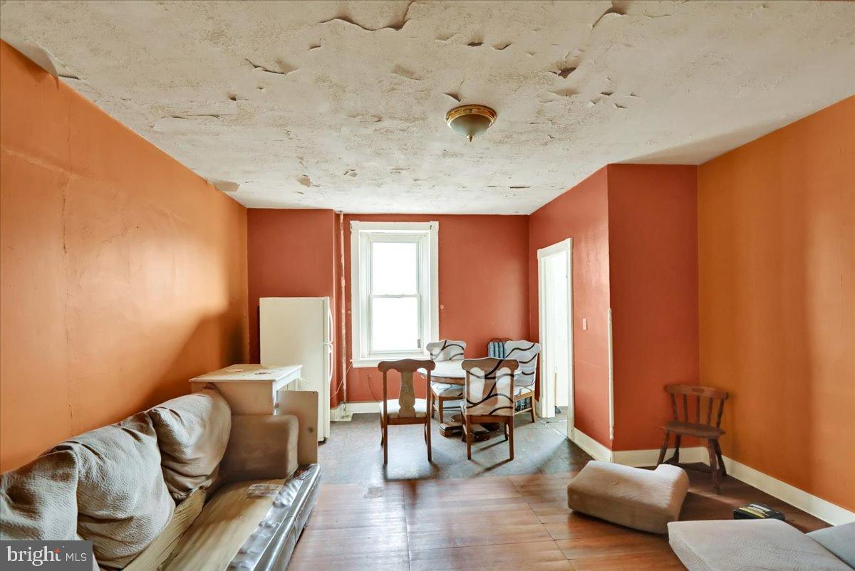 200 West Lancaster Avenue Reading, PA 19607 - Photo 37 of 50 a living room with furniture and a large window