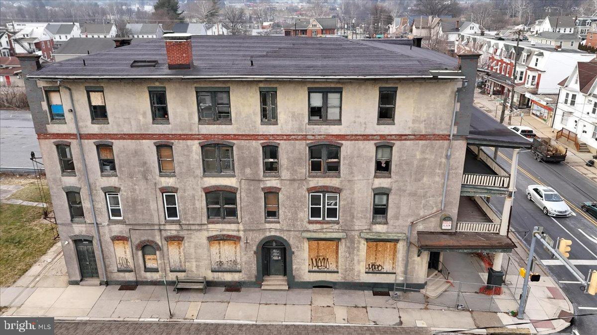 200 West Lancaster Avenue Reading, PA 19607 - Photo 9 of 50 a front view of a residential apartment building with a yard