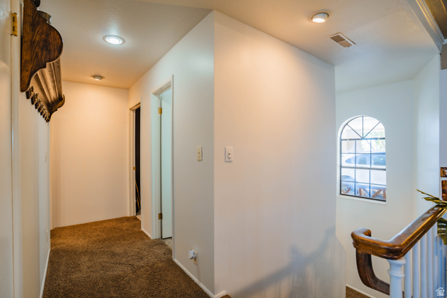 980 Cactus Circle St. George, UT 84790 - Photo 20 of 77 Hallway featuring dark colored carpet