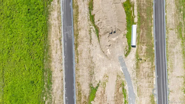 an aerial view of residential house with outdoor space