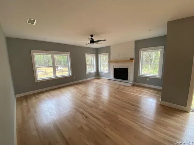a view of a garden with a building in the background