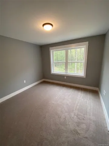 a bathroom with a double vanity sink and mirror