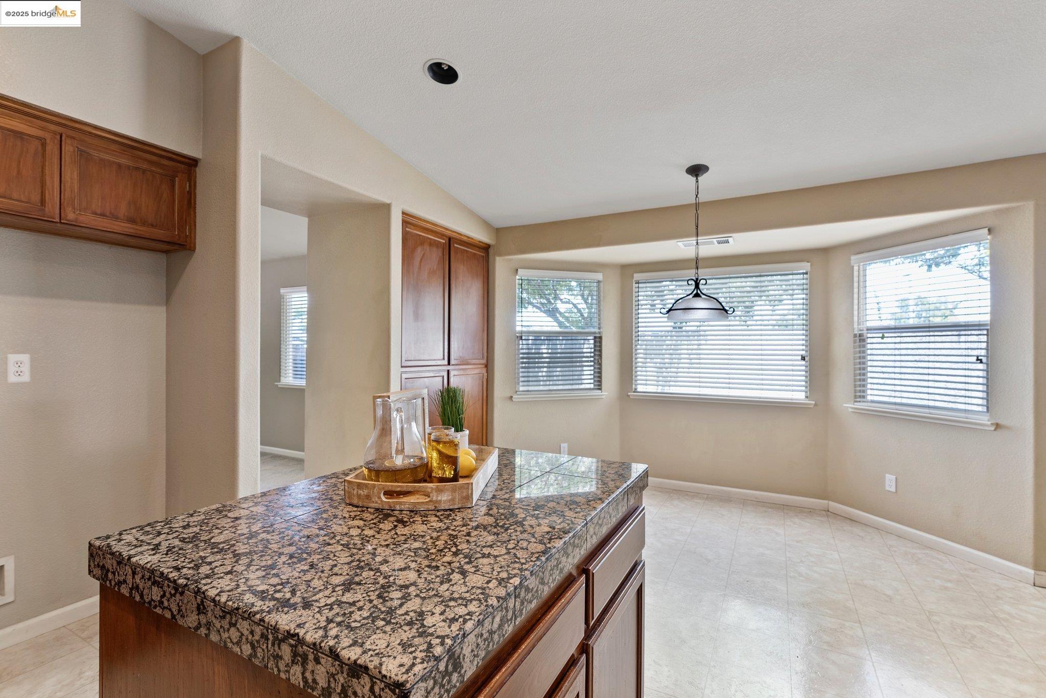 5200 Mohican Way Antioch, CA 94531 - Photo 12 of 50 a view of a kitchen with granite countertop a counter space and windows