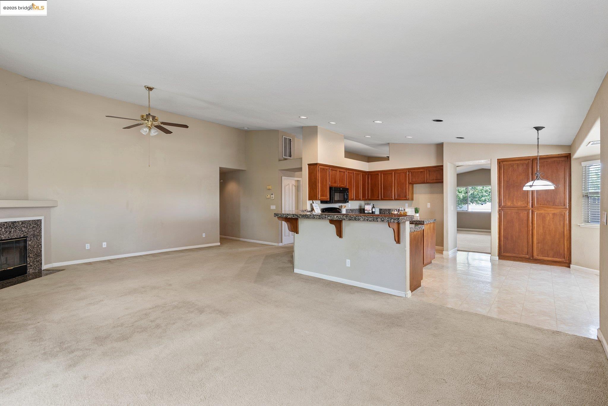 5200 Mohican Way Antioch, CA 94531 - Photo 20 of 50 a view of a kitchen with a sink and a fireplace