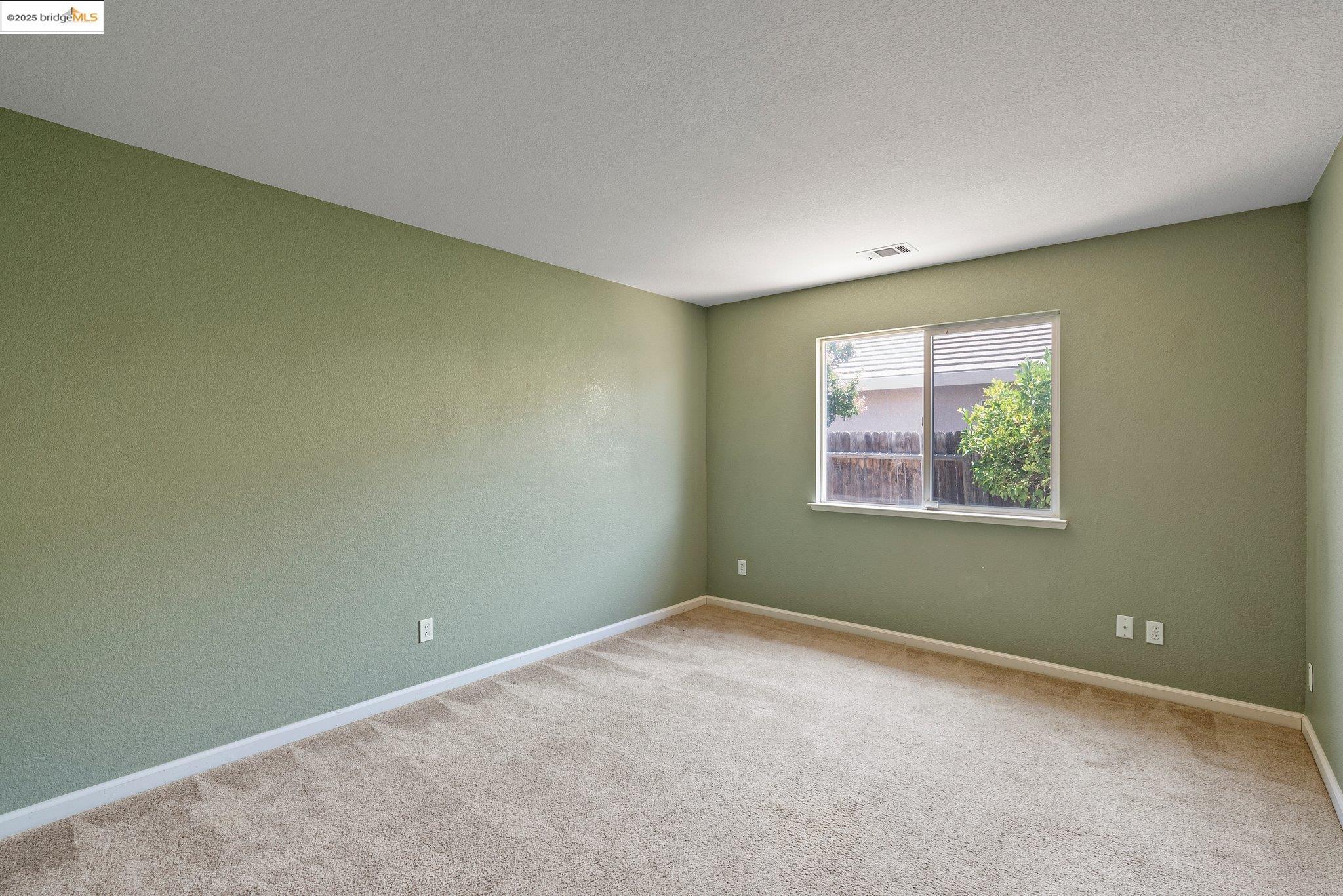 5200 Mohican Way Antioch, CA 94531 - Photo 29 of 50 an empty room with a window
