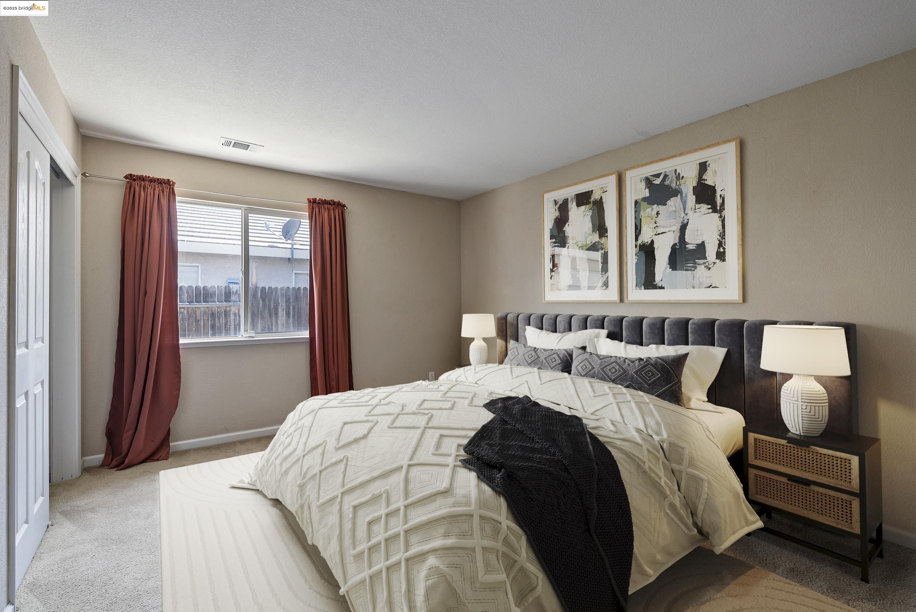 5200 Mohican Way Antioch, CA 94531 - Photo 36 of 50 a spacious bedroom with a large bed and a window