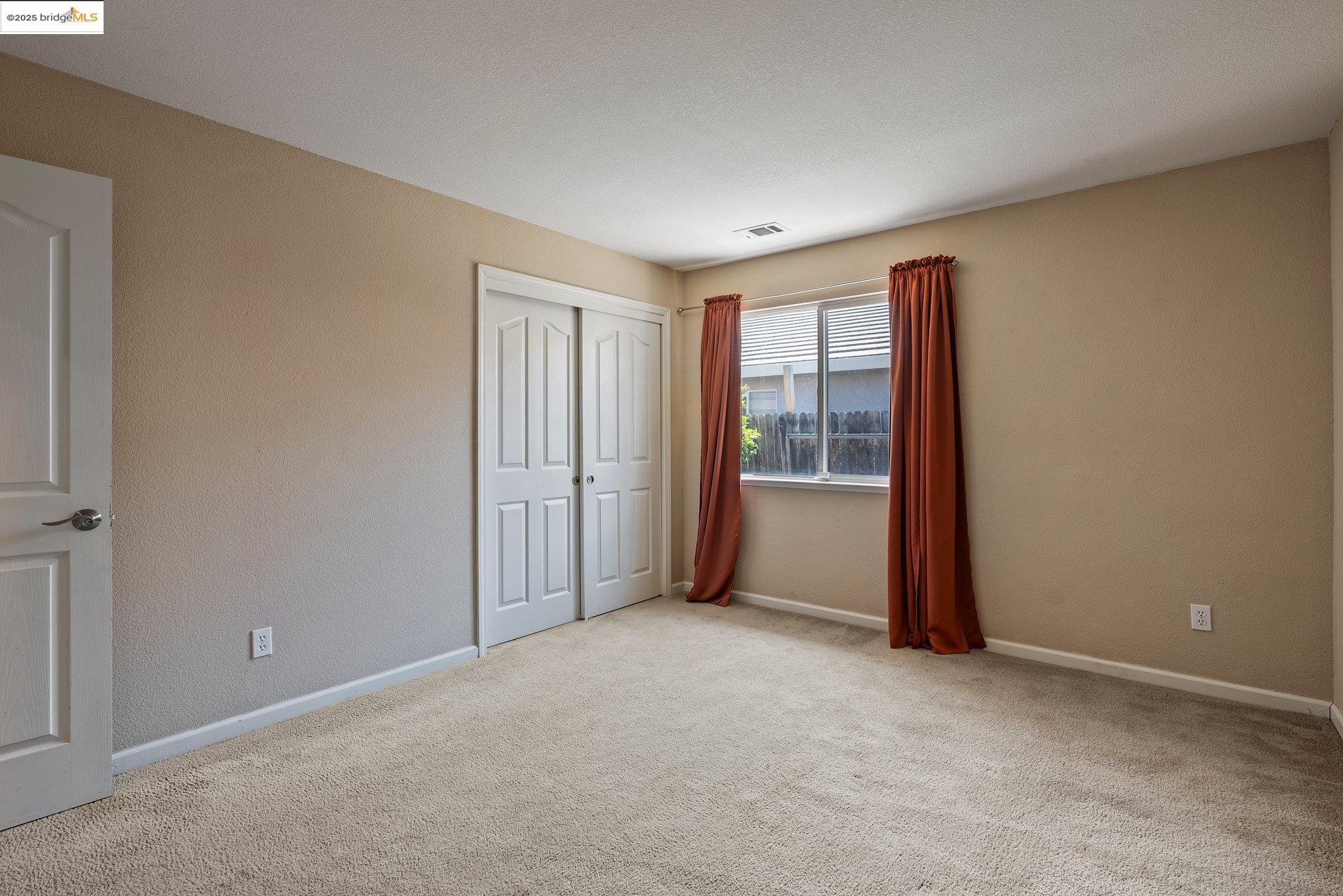 5200 Mohican Way Antioch, CA 94531 - Photo 38 of 50 a view of an empty room with a window