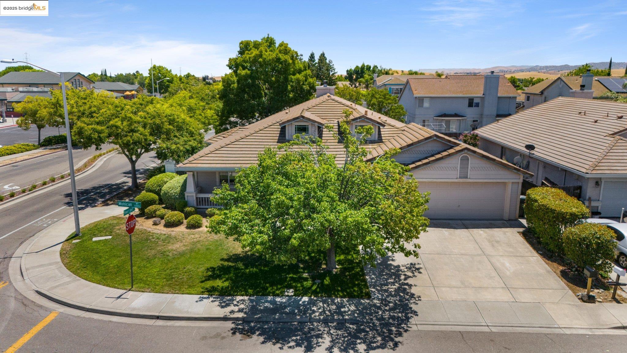 5200 Mohican Way Antioch, CA 94531 - Photo 48 of 50 a aerial view of a house with a yard and potted plants