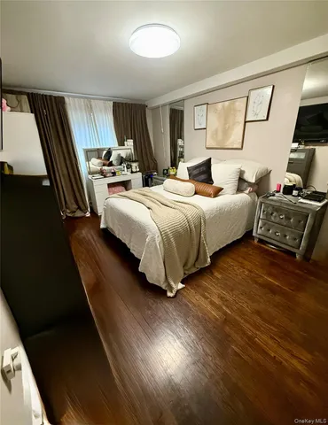 front view of a building with a bench