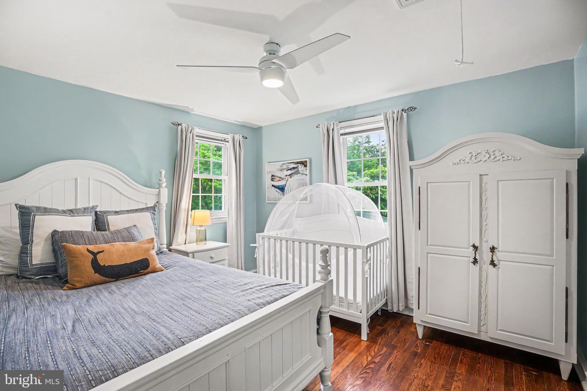 235 Hopkins Road Haddonfield, NJ 08033 - Photo 30 of 47 a bedroom with furniture and a wooden floor