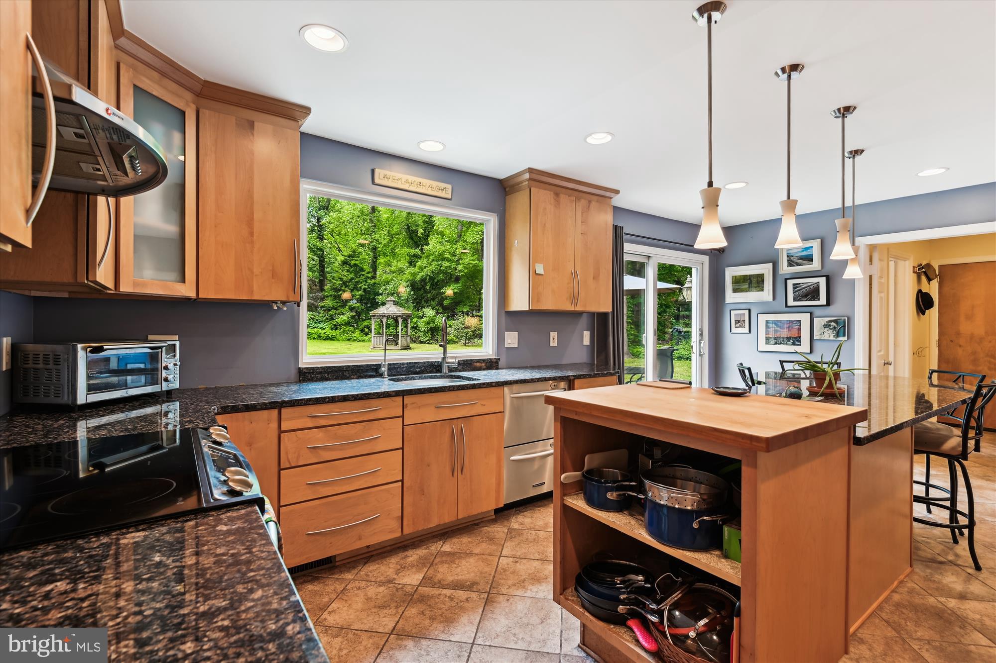 2104 Harbor Drive Annapolis, MD 21409 - Photo 53 of 86 a kitchen with stainless steel appliances granite countertop a stove a sink and a refrigerator