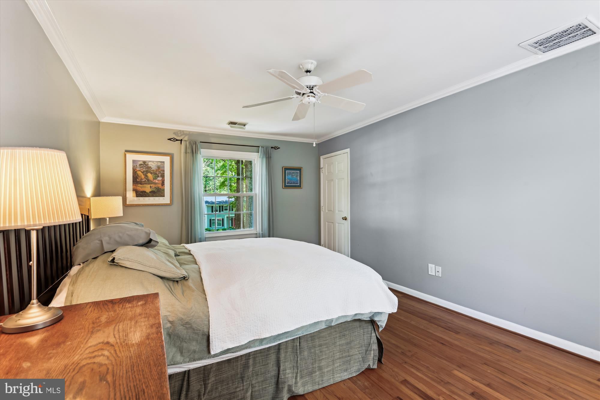 2104 Harbor Drive Annapolis, MD 21409 - Photo 56 of 86 a bedroom with a bed and wooden floor