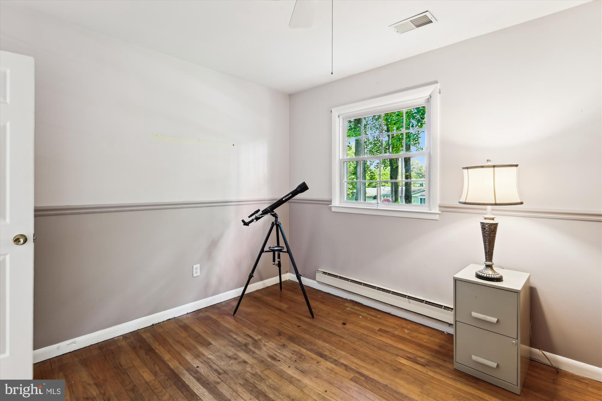 2104 Harbor Drive Annapolis, MD 21409 - Photo 60 of 86 a view of a room with wooden floor fan and windows