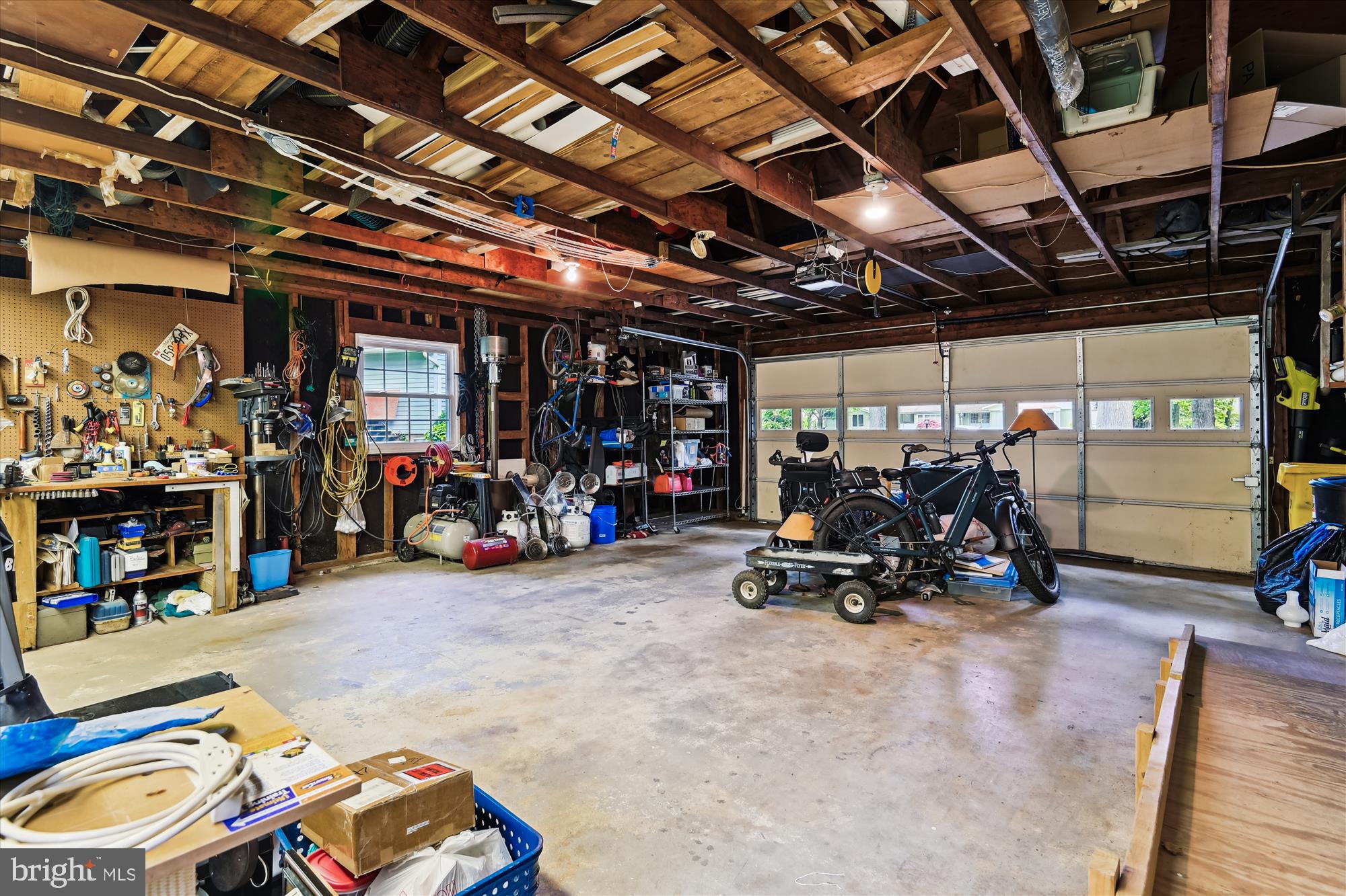 2104 Harbor Drive Annapolis, MD 21409 - Photo 66 of 86 a view of a garage with a bike and car