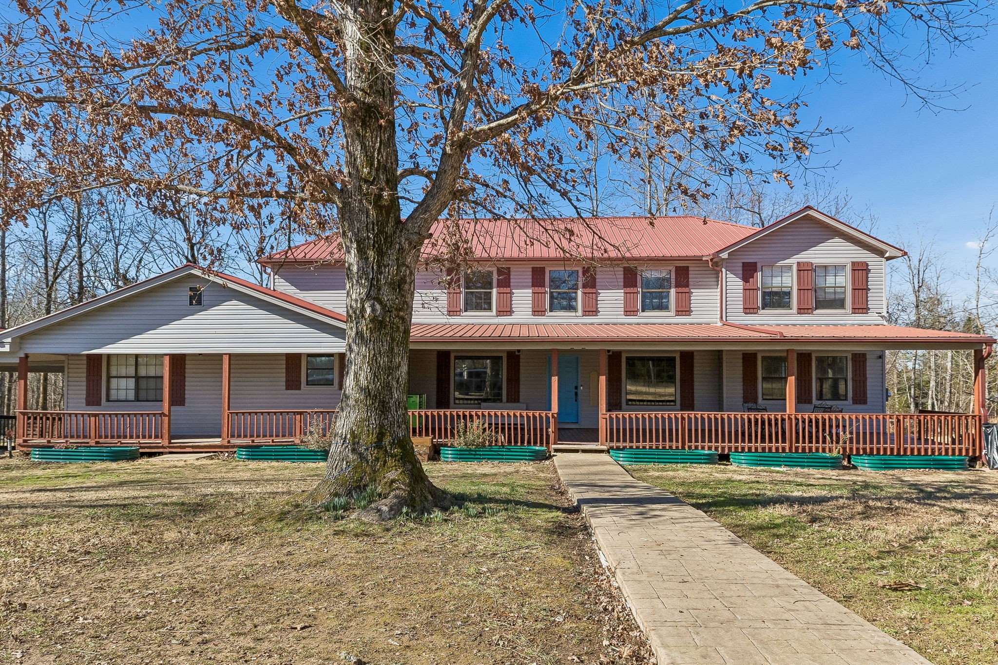 485 Lower Roans Creek Road Linden, TN 37096 - Photo 2 of 43 front view of a house with a yard